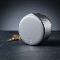 Wifi Smart Lock Silver (Retrofits over Existing Deadbolt) — Studio Shot